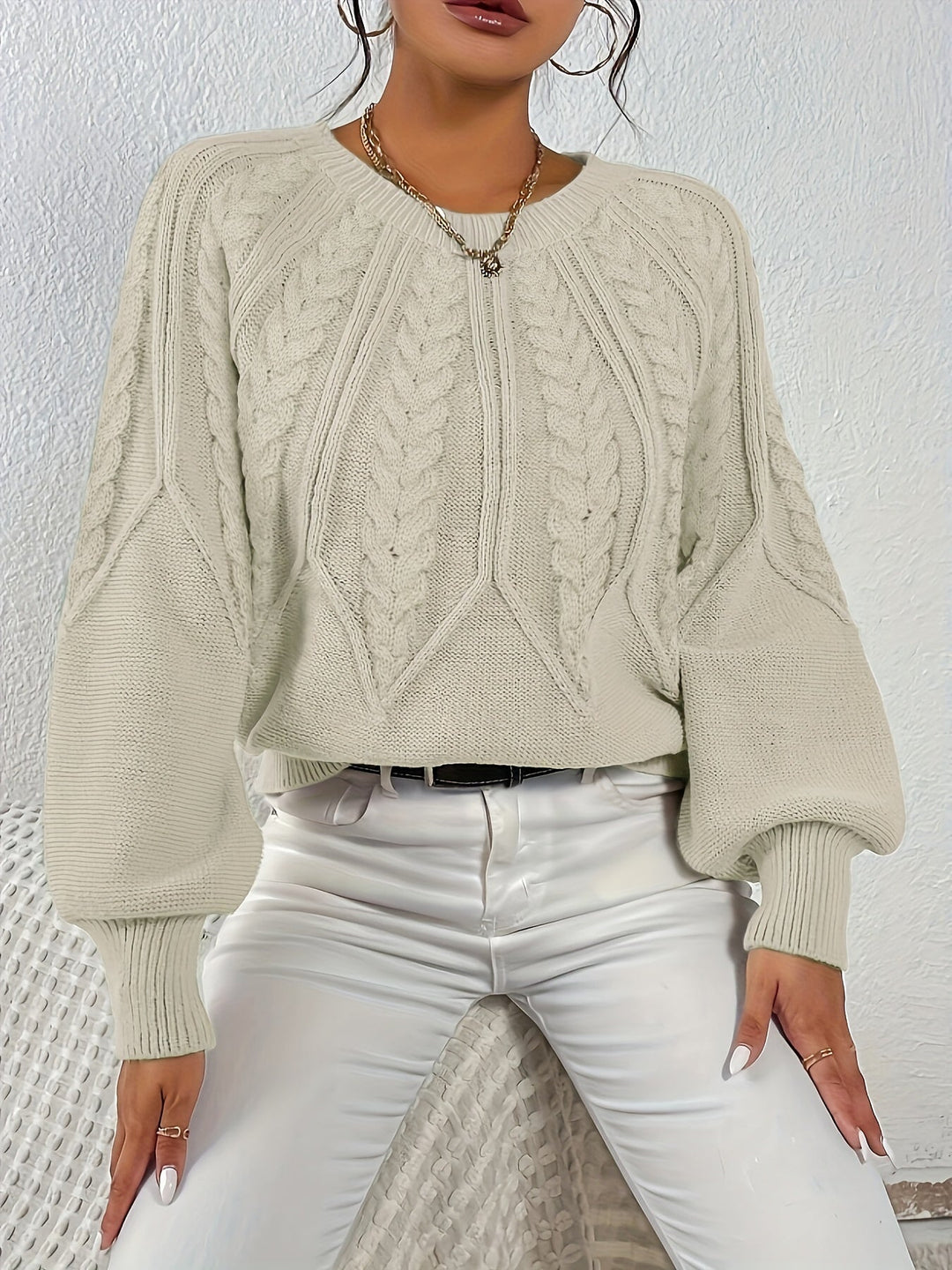 Swobodny warkoczowy splot sweter